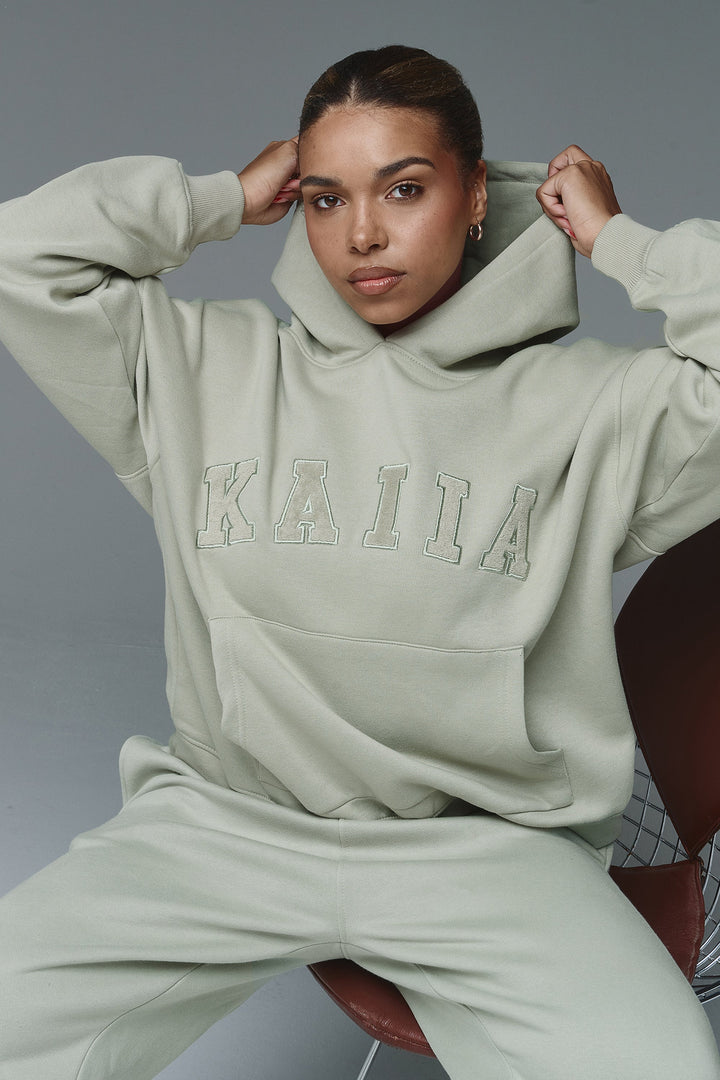 Kaiia Oversized Slogan Hoodie in Sage Green – Cozy and Stylish Loungewear