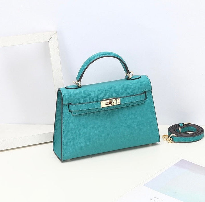 Elegant Leather Handbag for Women - Classic Top Handle Design with Adjustable Strap