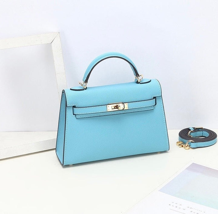 Elegant Leather Handbag for Women - Classic Top Handle Design with Adjustable Strap